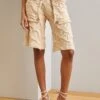 Full Fashioned With Extended Pockets Elastic Waist And Handcrafted Button Detail - Shorts - Off White