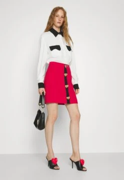 MOSCHINO Punk Buttons - Mini Skirt -Pieces Shop 07e4903dc232461c8f86e432f851bcee