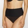 Maidenform Tame Your Tummy Shaping Thong Firm Control - Shapewear - Black -Pieces Shop 63d136d1f877457c98244a34b230bf28