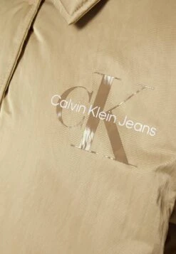Calvin Klein Jeans Oversized Padded Coach Jacket - Short Coat - Travertine -Pieces Shop b0fa929209c1473c9348b4aa9de47ebc