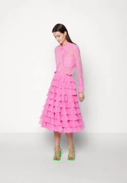 Norma Kamali Ruffle Skirt - A-Line Skirt -Pieces Shop e877b55c0db34f53be2b4f53d5b469c1